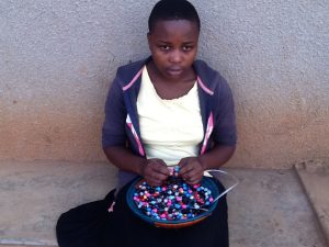 Girl Trainer in Paper Beads Trade